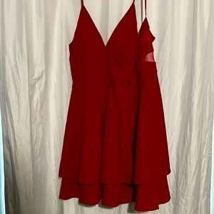 A red spaghetti strapped prom dress